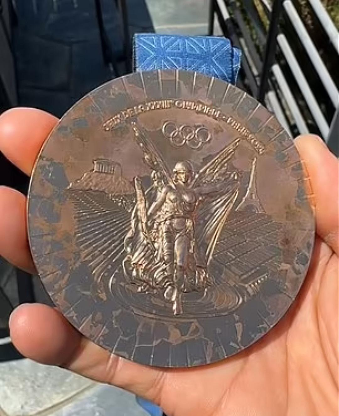 A screenshot of Nyjah's Instagram story showing the tarnished bronze medal