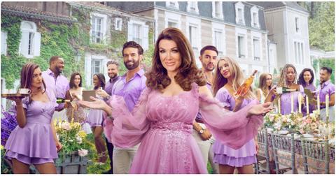 'Vanderpump Villa' cast behind Lisa Vanderpump in pinks and purples - promo photo