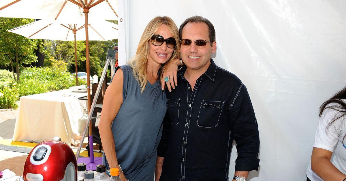 (l-r): Taylor Armstrong and Russell Armstrong embracing at an event.