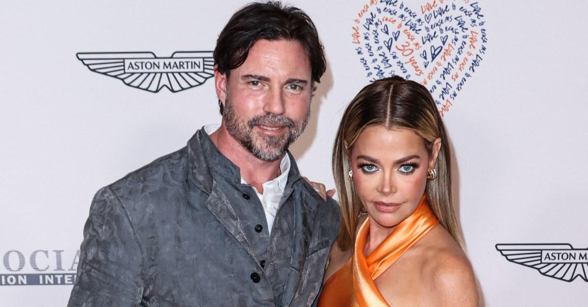 Denise Richards and her husband, Aaron Phypers, at an Aston Martin event.