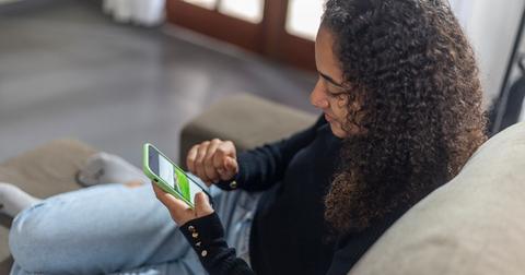 Shot of woman looking at her phone