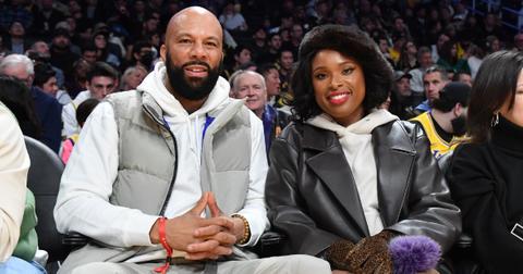 Common and Jennifer Hudson attend a basketball game between the Los Angeles Lakers and the Dallas Mavericks