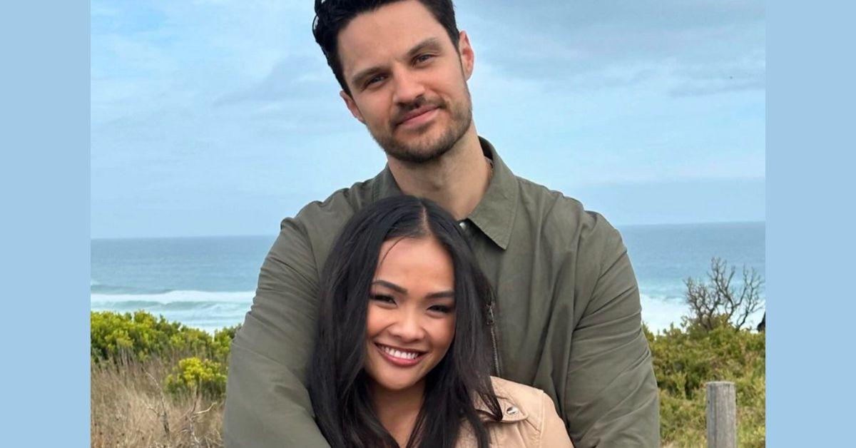 Spencer Conley poses with his arms around Jenn Tran