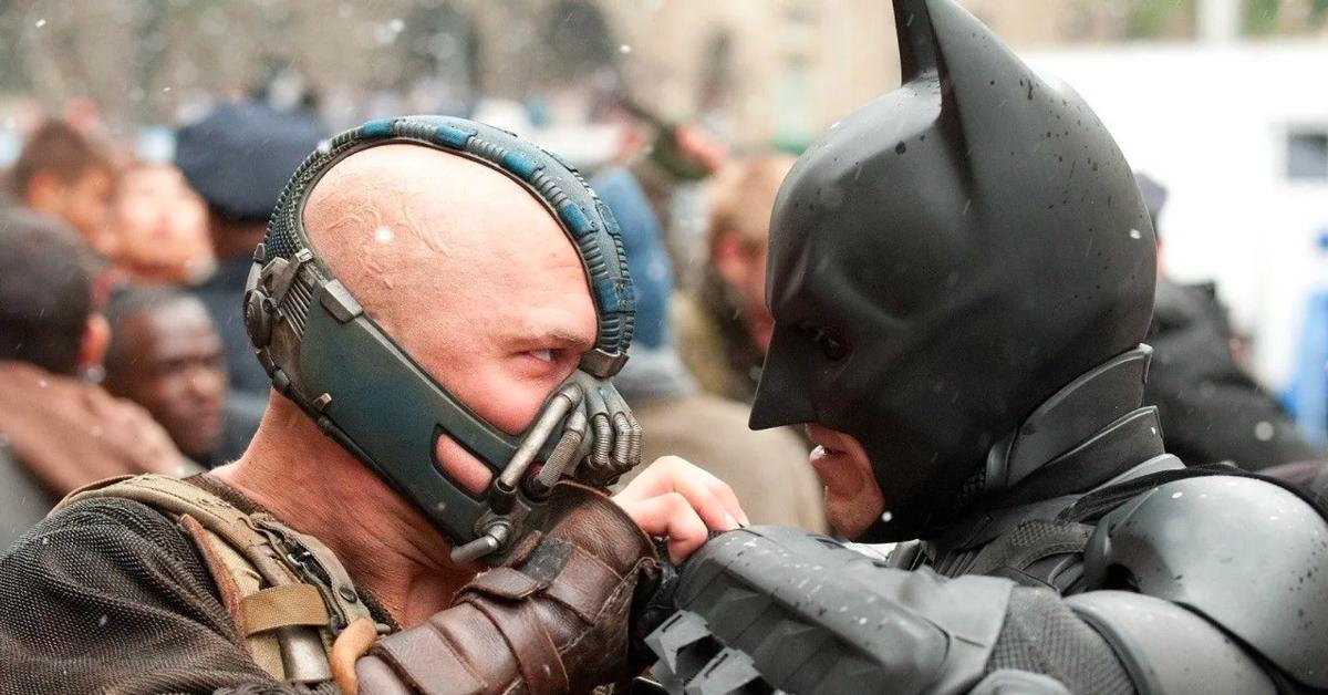 Bane (Tom Hardy) and Batman (Christian Bale) fight in 'The Dark Knight Rises'