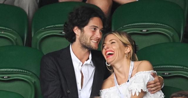 Sienna Miller in white dress with boyfriend Oli Green at Wimbledon 2022