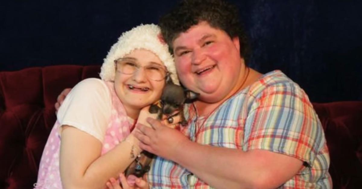 A young Gypsy Rose holding a puppy next to her mother Dee Dee.