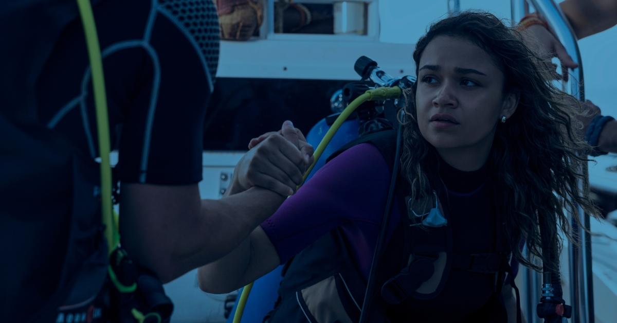 Madison Bailey as Kiara going diving in Season 4 of 'Outer Banks'