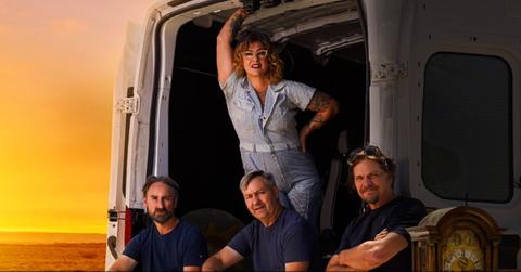 The cast of 'American Pickers' in the back of an open van.