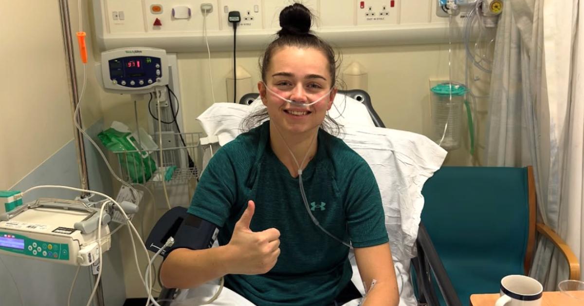 Georgia O'Connor gives a thumbs up from the hospital