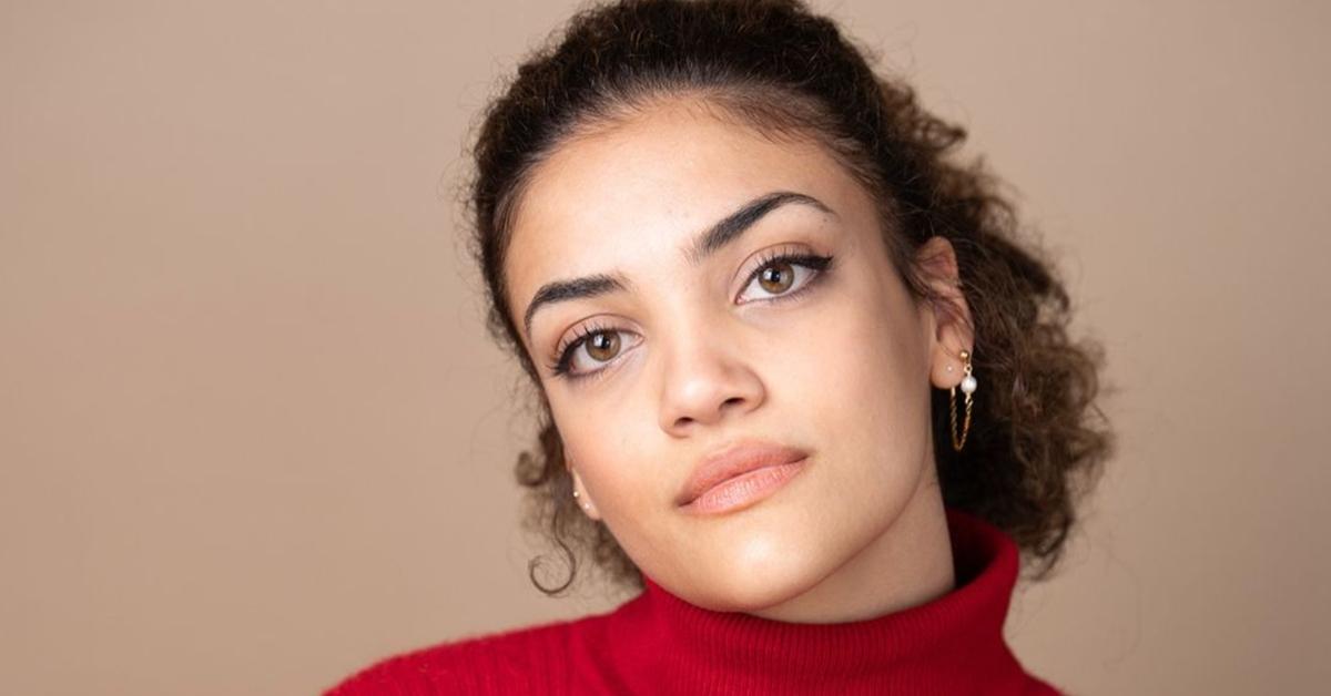 Laurie Hernandez in red turtleneck