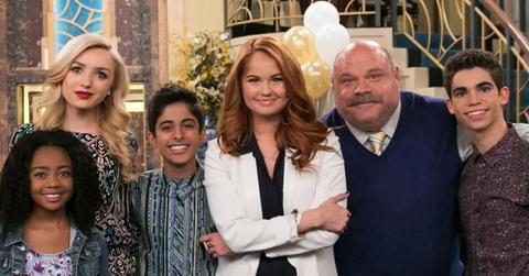 Cast of 'Jessie' poses for a photo