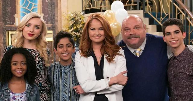 Cast of 'Jessie' poses for a photo