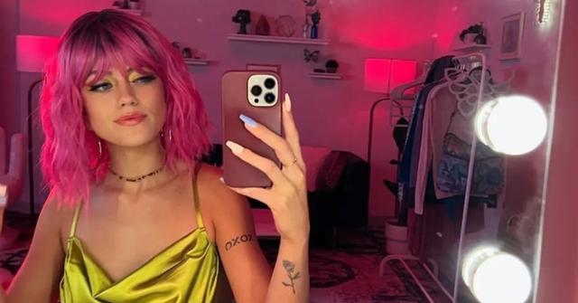 Mia Star taking a selfie in her dressing room