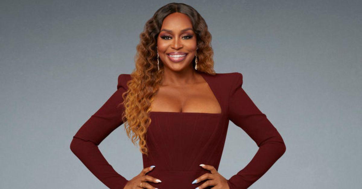 Quad Webb posing for a promo photo for 'Married to Medicine' Season 9