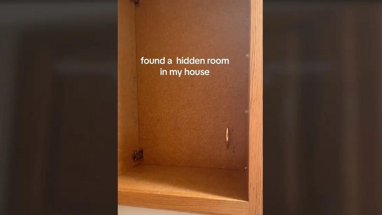 There's a door handle inside the cabinet that leads to the hidden room