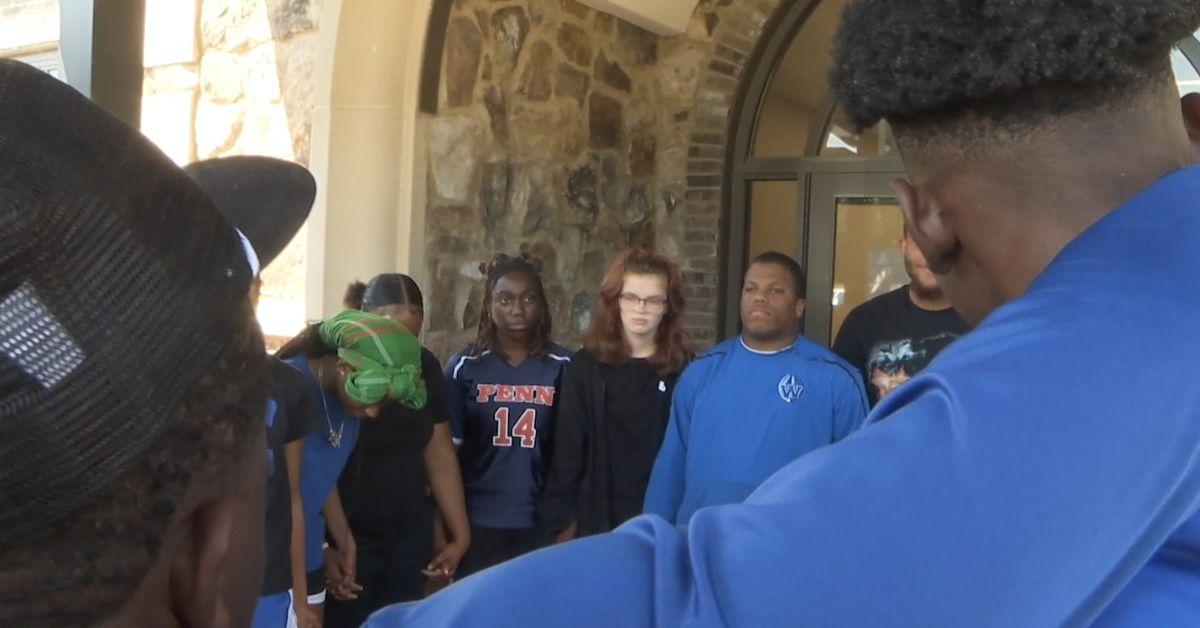Students mourn the loss of Kenny Simmons. 