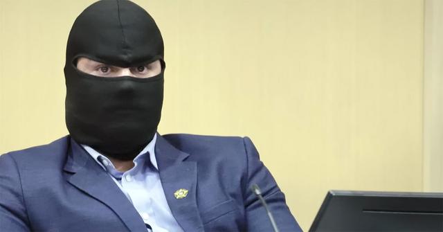 Danny Polo masked on the stand at the YNW Melly trial.