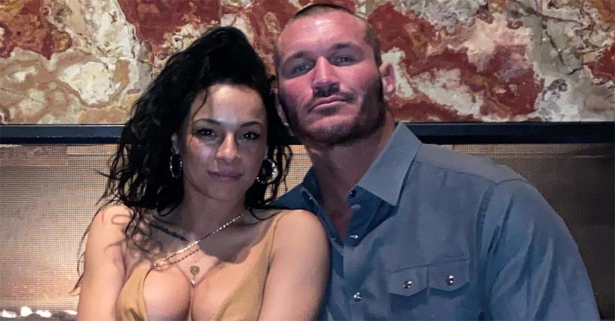 Randy Orton and his wife Kim posed next to one another. 