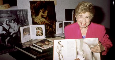 Dr. Ruth with some of her books c. 1990