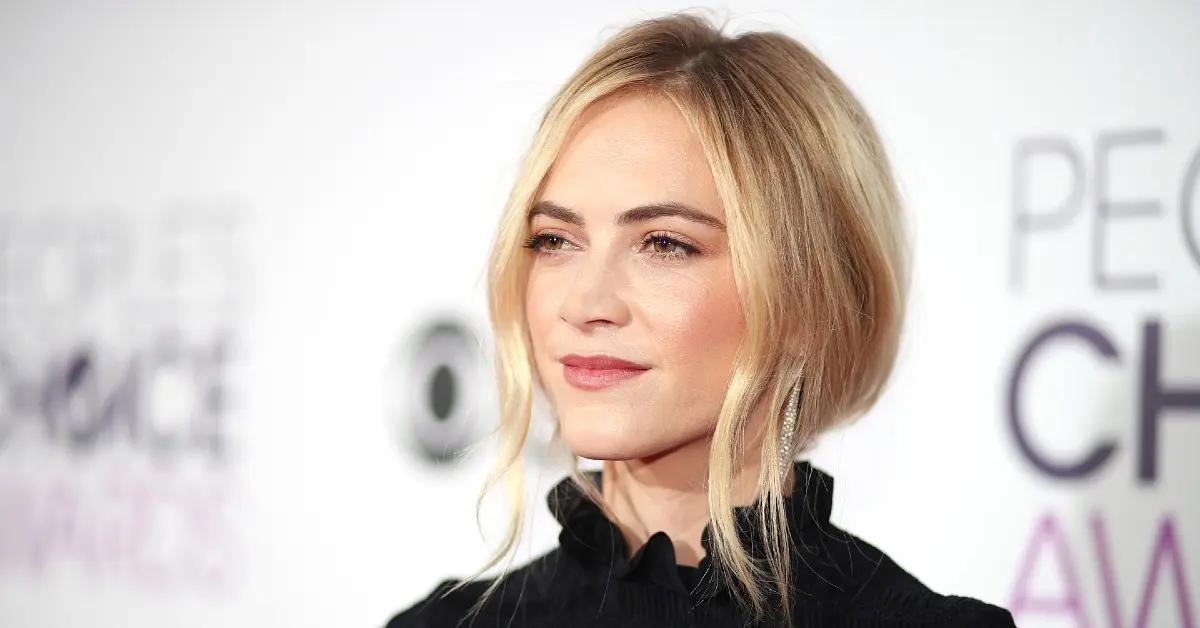 Emily Wickersham wearing a black top to the People's Choice Awards.