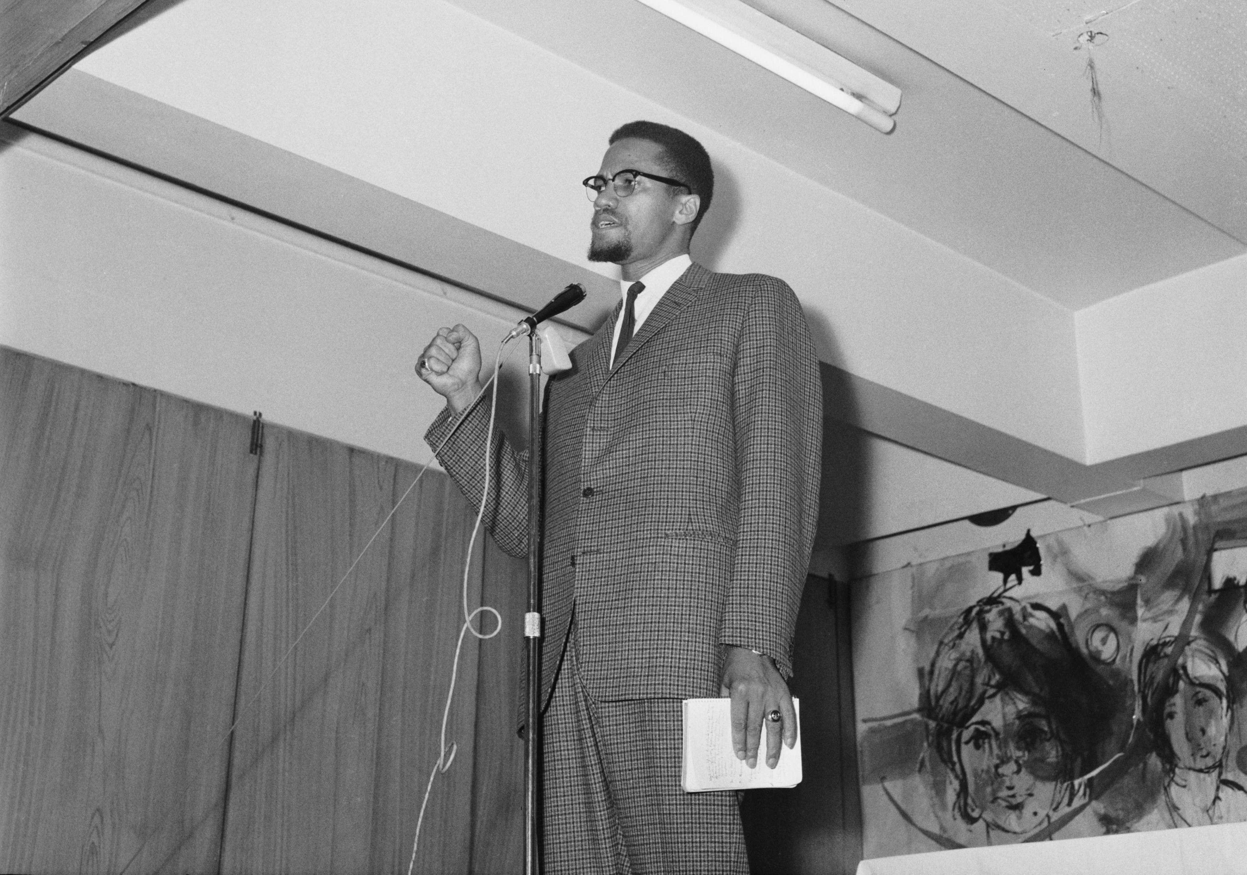 Malcolm X delivering a speech in the UK on Nov. 22, 1964.