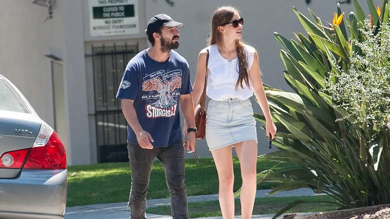 Shia LaBeouf and Mia Goth walking together