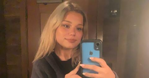 Whitney Purvis smiles for a mirror selfie.