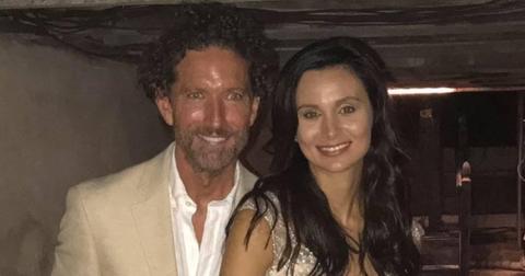 Doug Benefield and Ashley Benefield smile in a photo