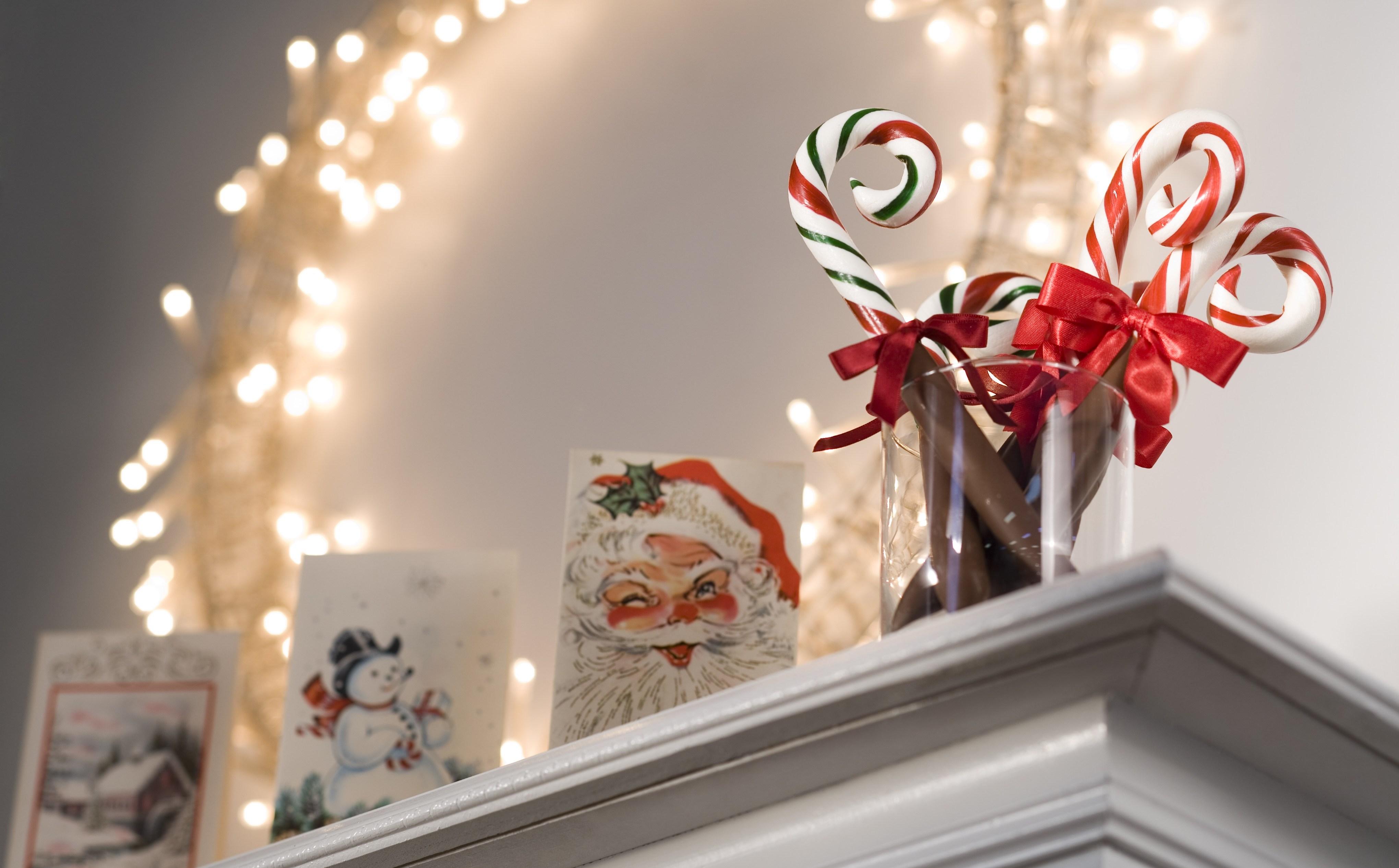 Christmas candy canes on mantle.