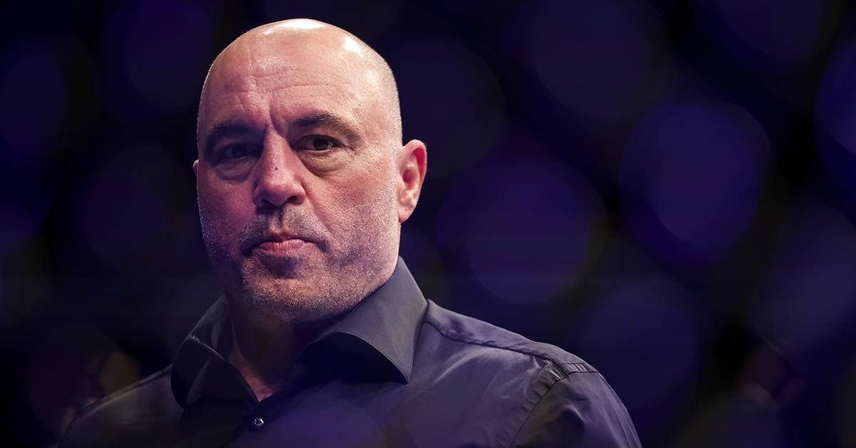 Joe Rogan in a black shirt at a UFC event. 