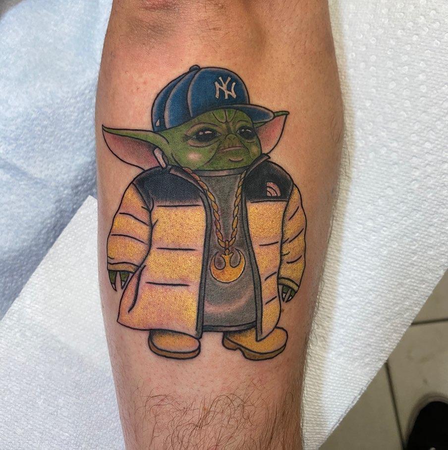 This dude got a tattoo of Baby Yoda drinking a White Claw