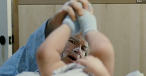 featured dad changes diaper