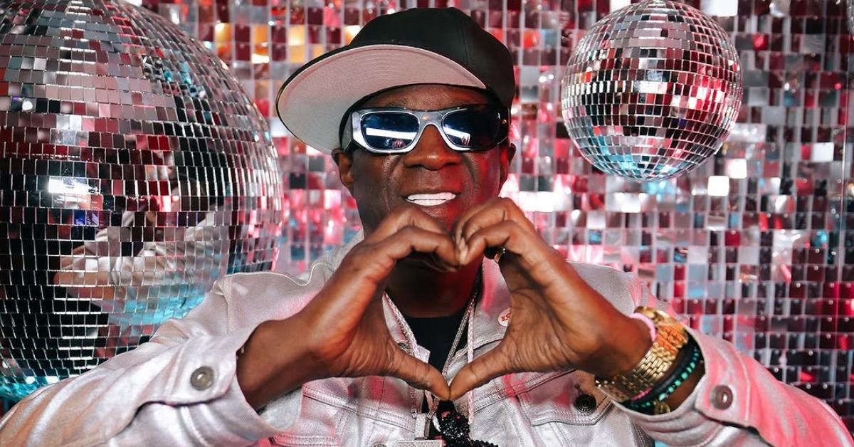 Flavor Flav in a room of disco balls 