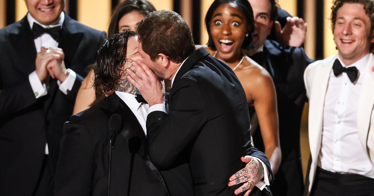 Matty Matheson and Ebon Moss-Bachrach kissing on stage during the 75th Primetime Emmy Awards on Jan. 15, 2024 