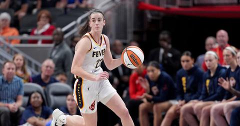 Caitlin Clark #22 of the Indiana Fever dribbles the ball during a game against the Washington Mystics