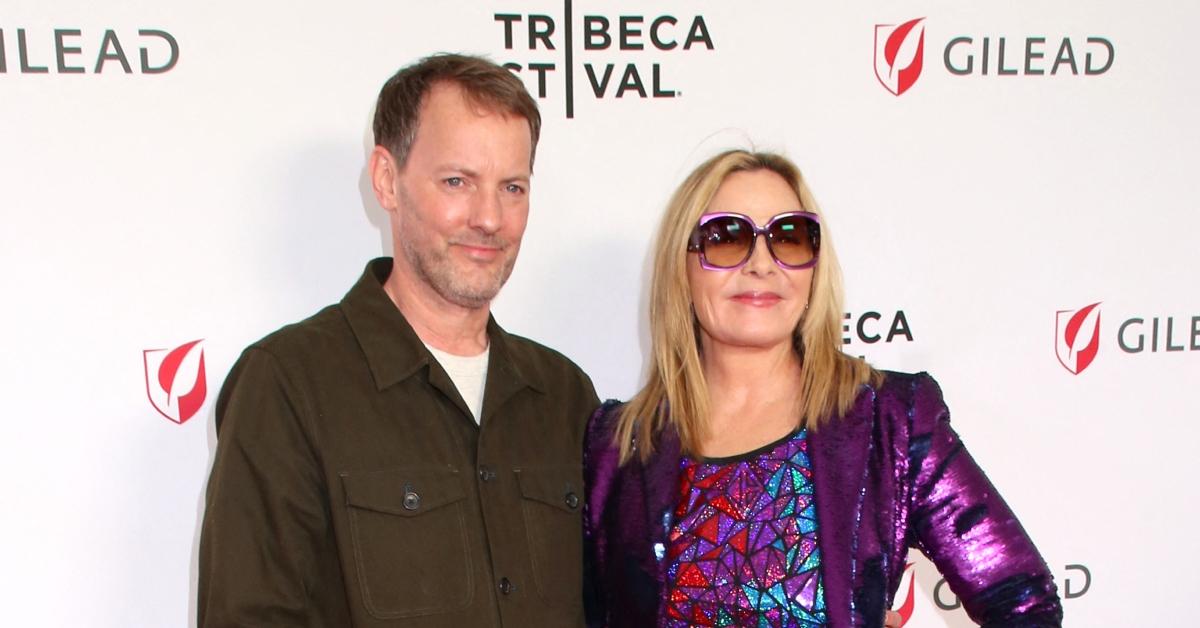 (l-r): Kim Cattrall's husband, Russell Thomas, and Kim Cattrall at an event.
