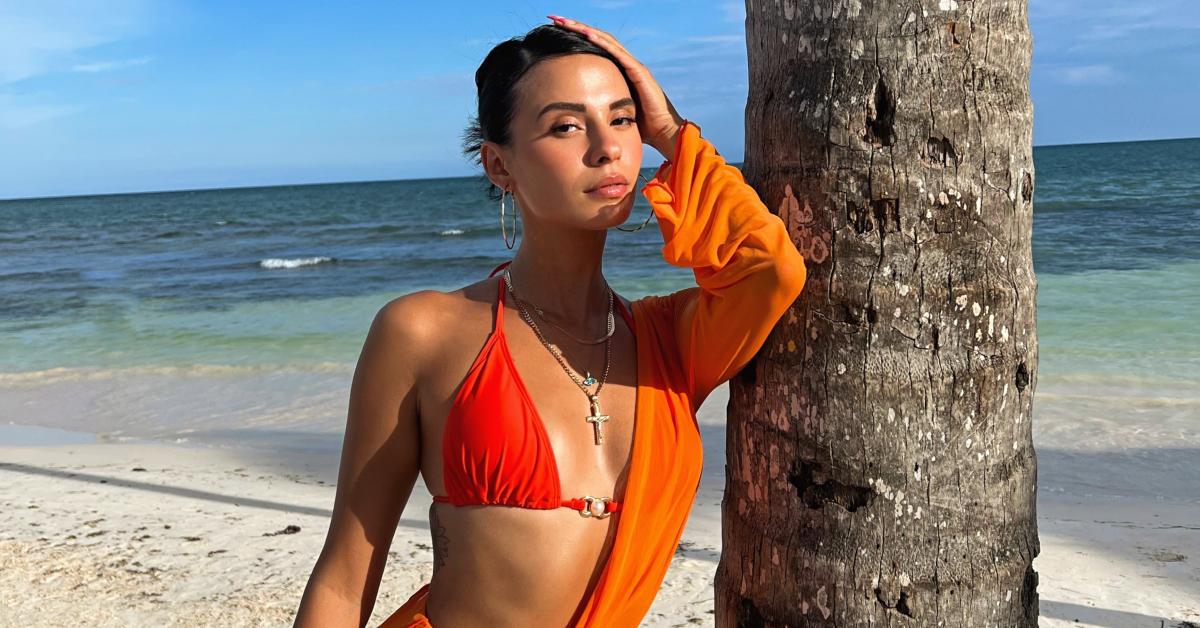 Xanthi Perdikomatis poses in a red bikini and orange cover-up while filming Season 2 of 'Perfect Match' in Mexico.