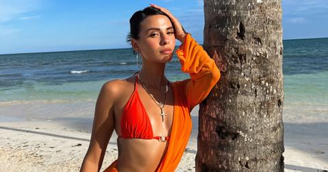 Xanthi Perdikomatis poses in a red bikini and orange cover-up while filming Season 2 of 'Perfect Match' in Mexico.