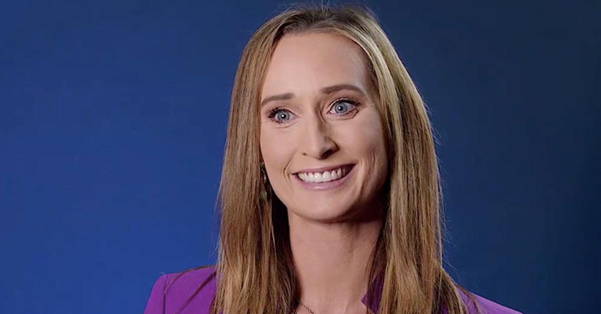 Amanda Hanson smiling wearing purple top