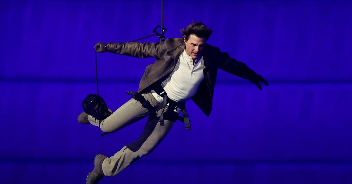 Tom Cruise repelling into Stade de France at the 2024 closing ceremonies. 