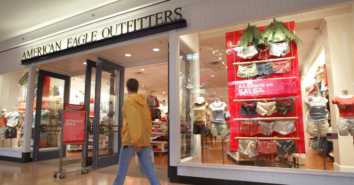 A shopper walks past an American Eagle Outfitters clothing store