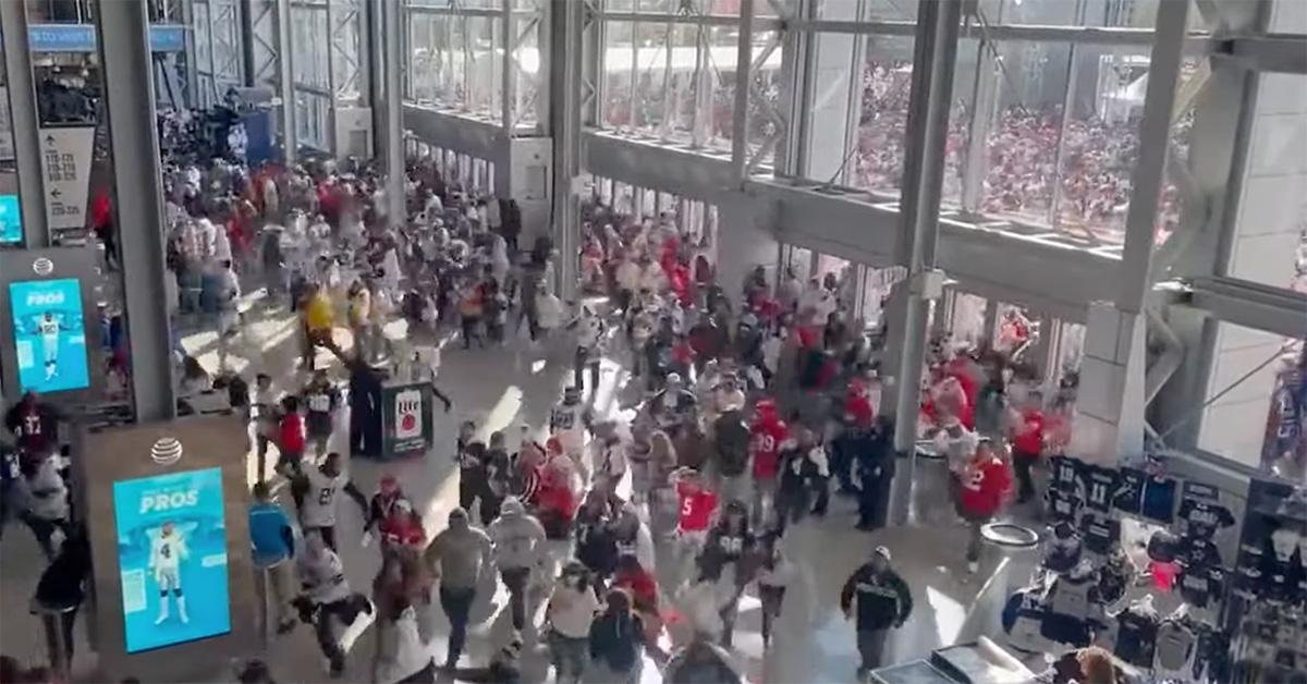 Fans rush into AT&T stadium in 2022. 