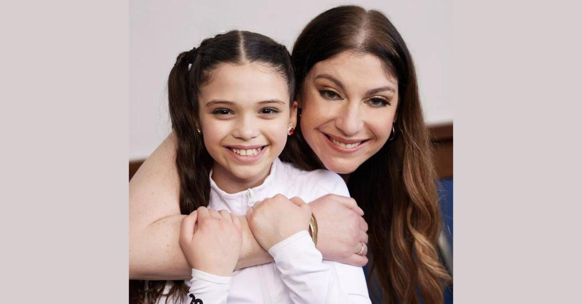 Lily poses for photo while her mother Corrine poses over her shoulder for 'Dance Moms: A New Era' promo photo