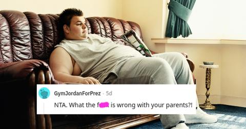 Overweight man sits on couch