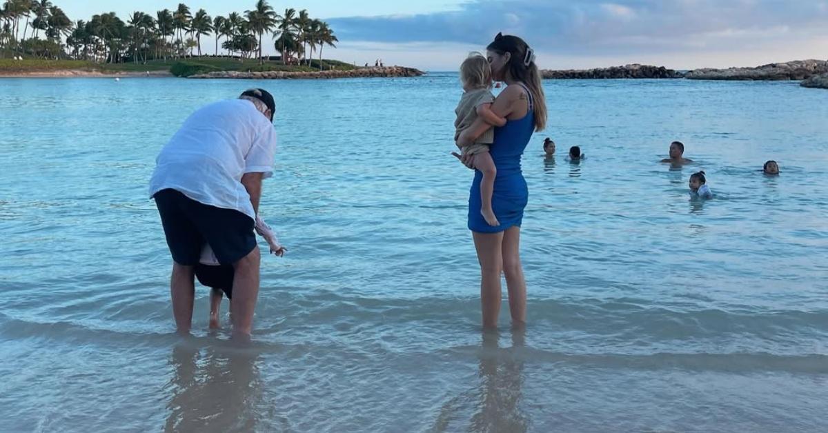 Bobbie Althoff with her family on a beach.