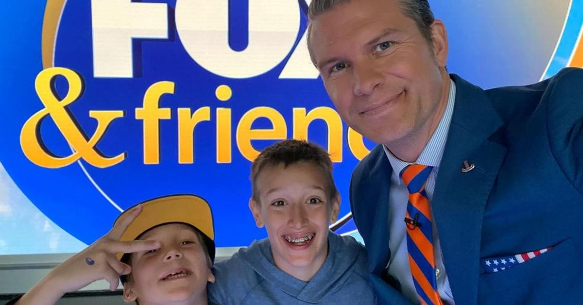 Pete Hegseth is at work with two of his children