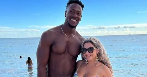 Yohan and Daniele from '90 Day Fiancé' on a beach.