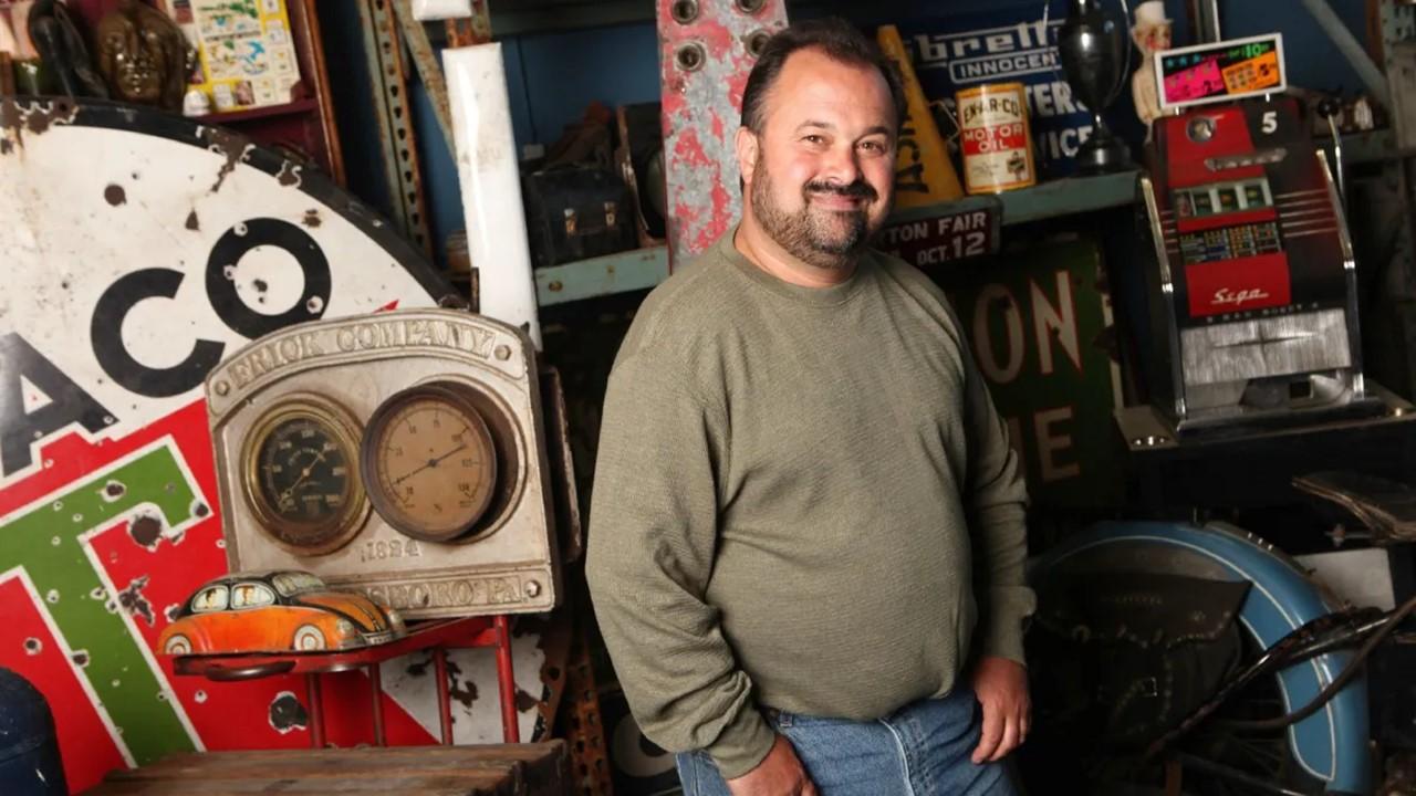 Frank Fritz standing in a garage