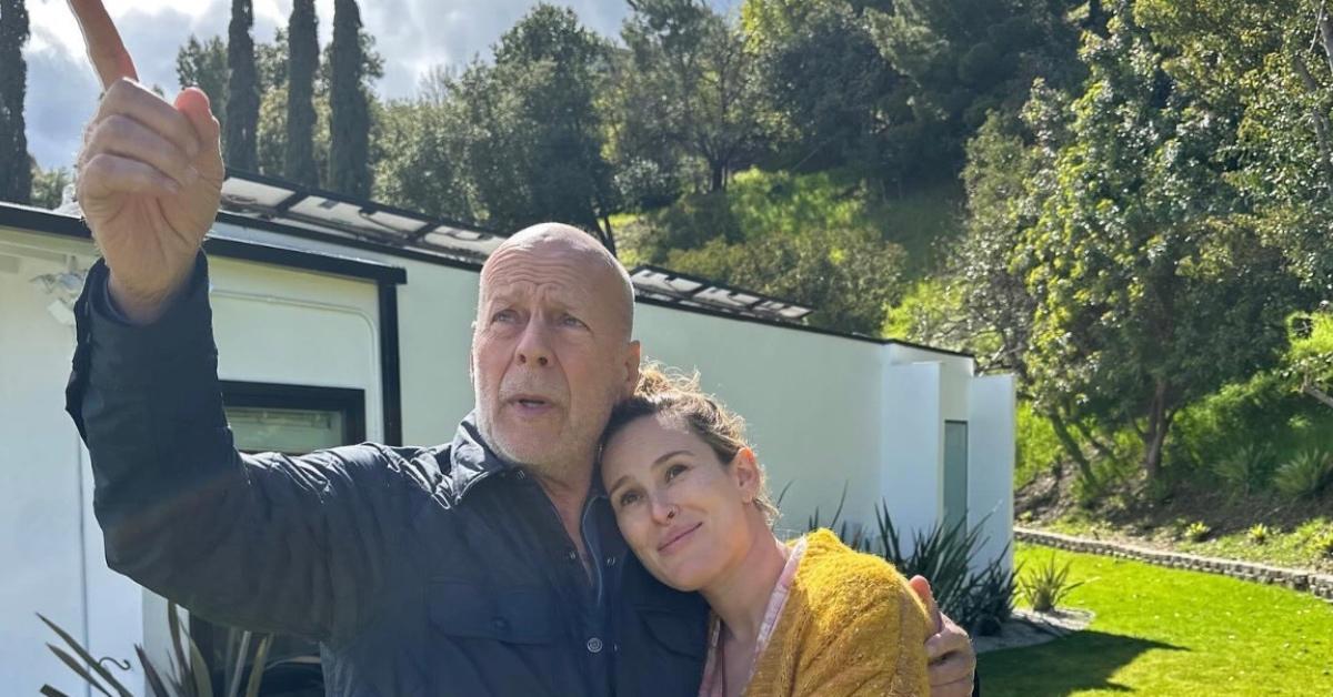 Rumer Willis hugging her dad, Bruce Willis