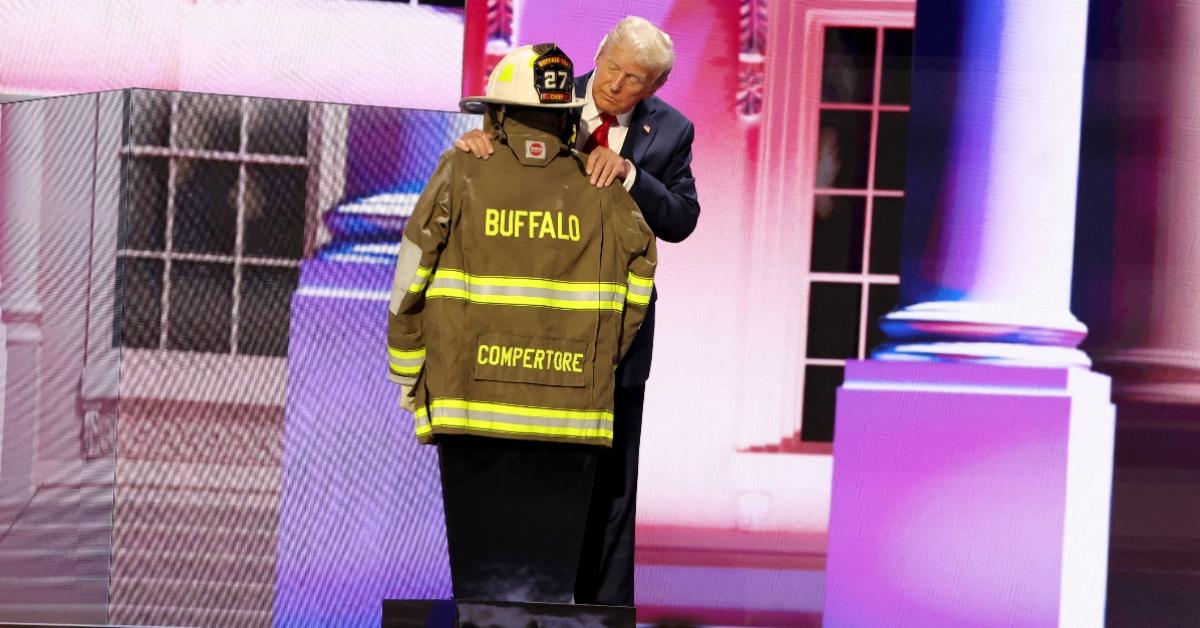 Former President Donald Trump stands by Corey Comperatore's turnout gear